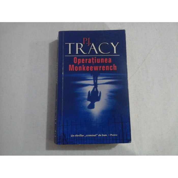      OPERATIUNEA  MONKEEWRENCH  -  P.J. TRACY 